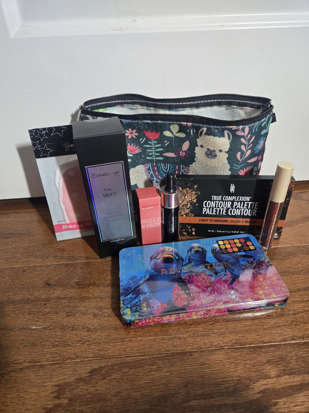 8 Item Makeup Bag- Revolution, The Creme Shop, Etc.